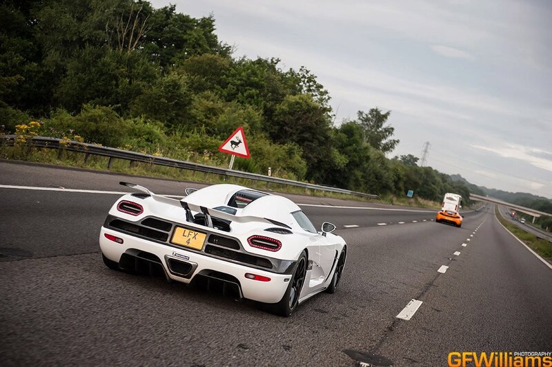 White Koenigsegg on the highway