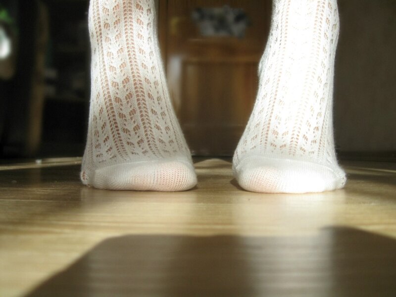 white lace socks on floor