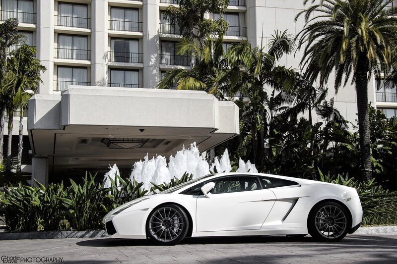 White Lamborghini at hotel entrance