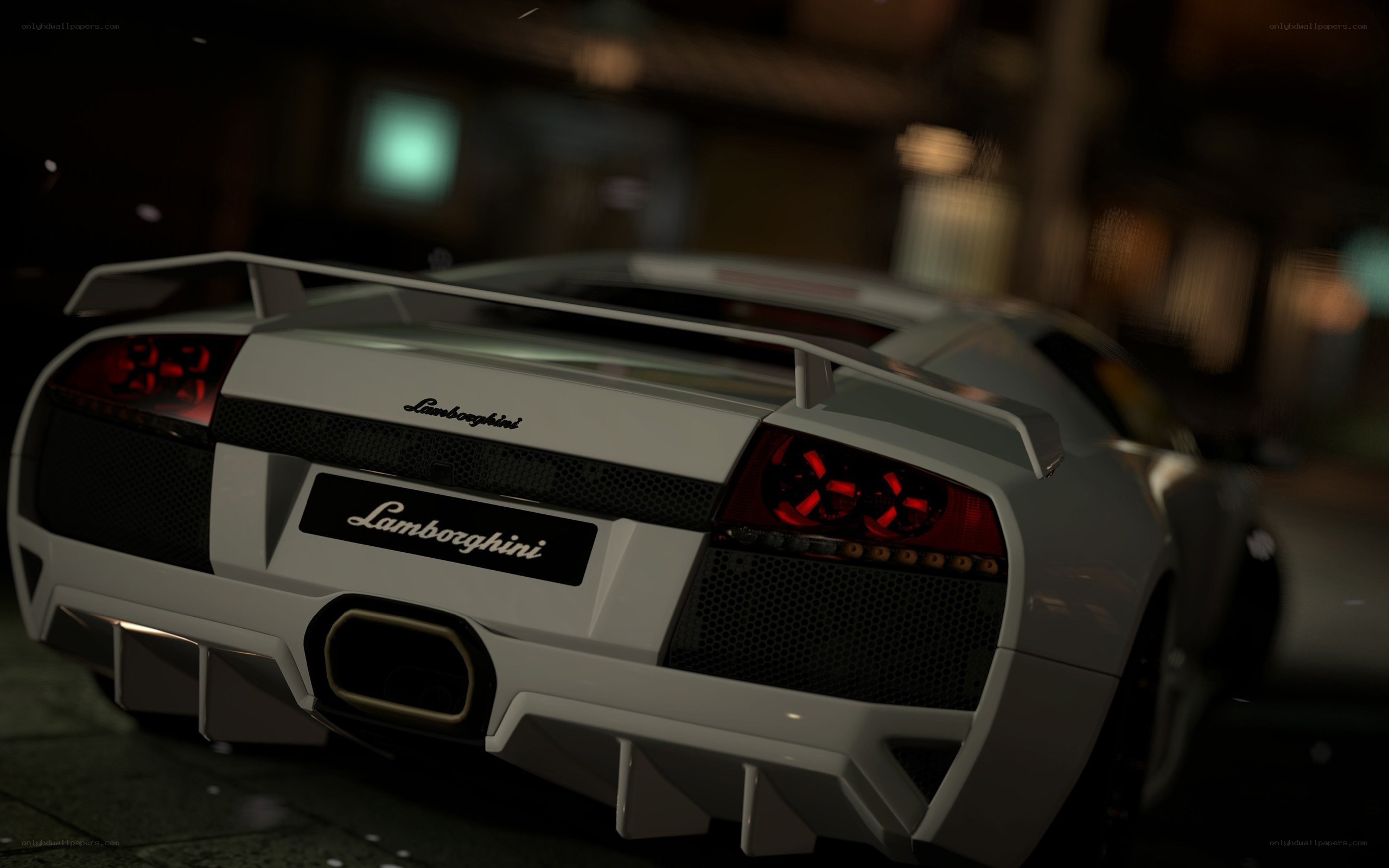 white lamborghini at night