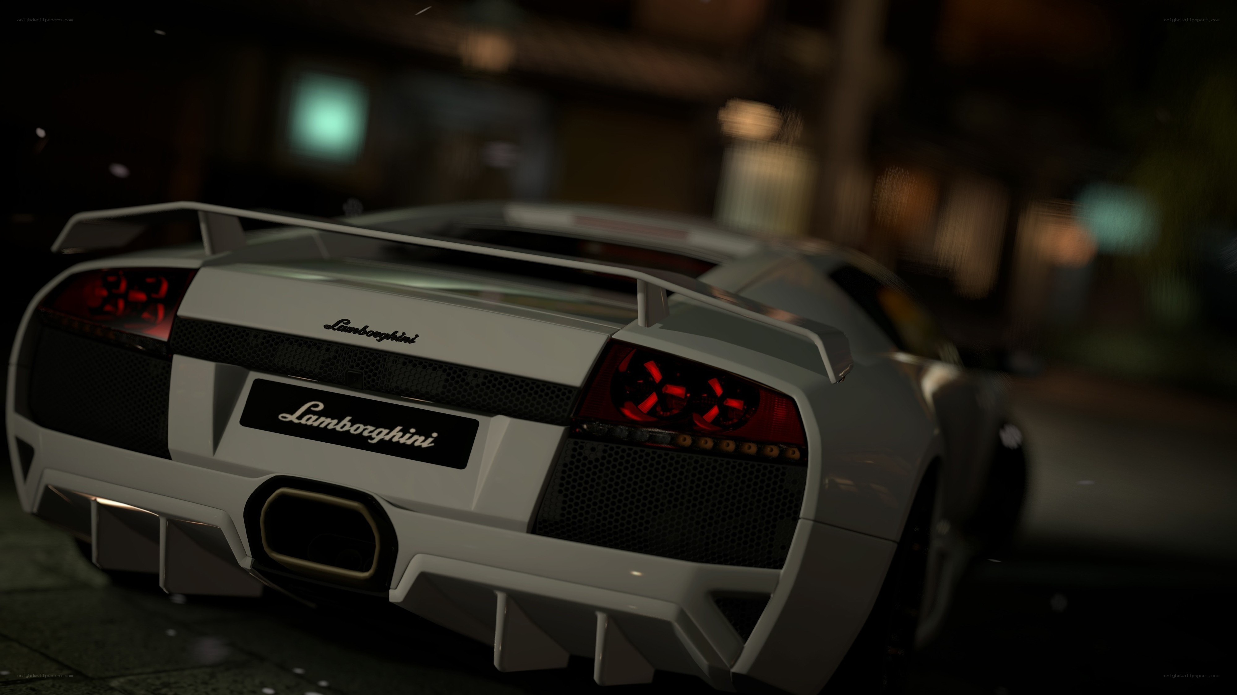 white lamborghini at night