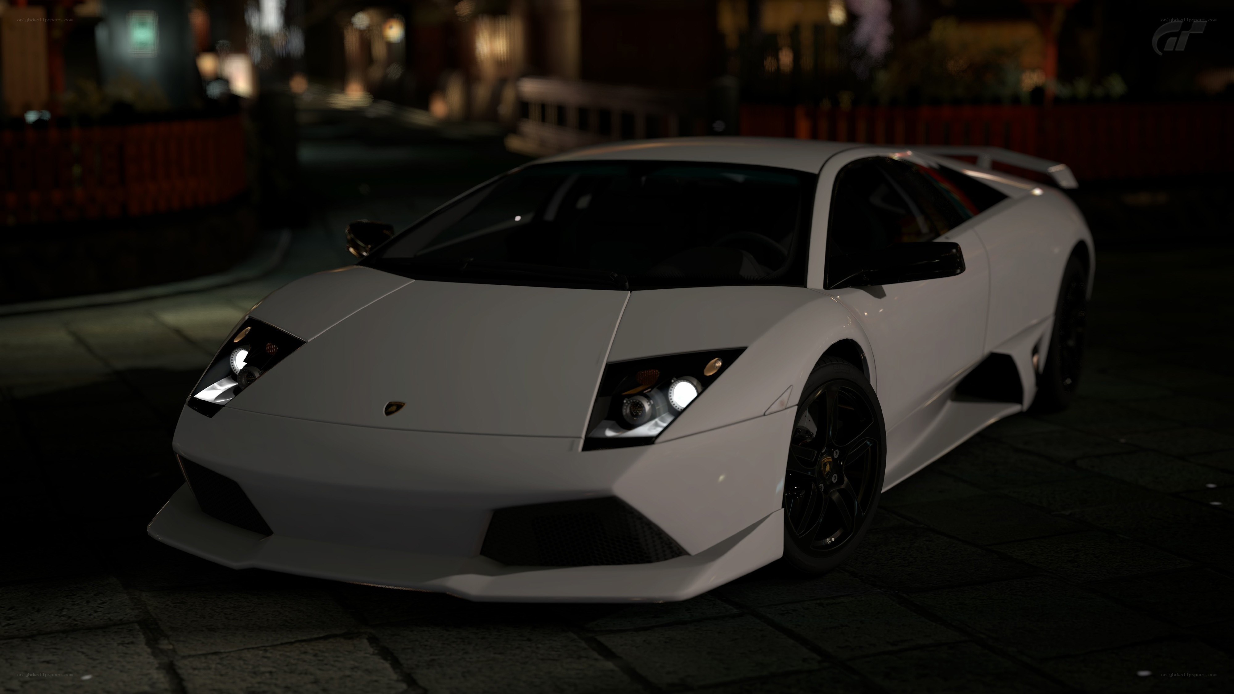 white lamborghini at night