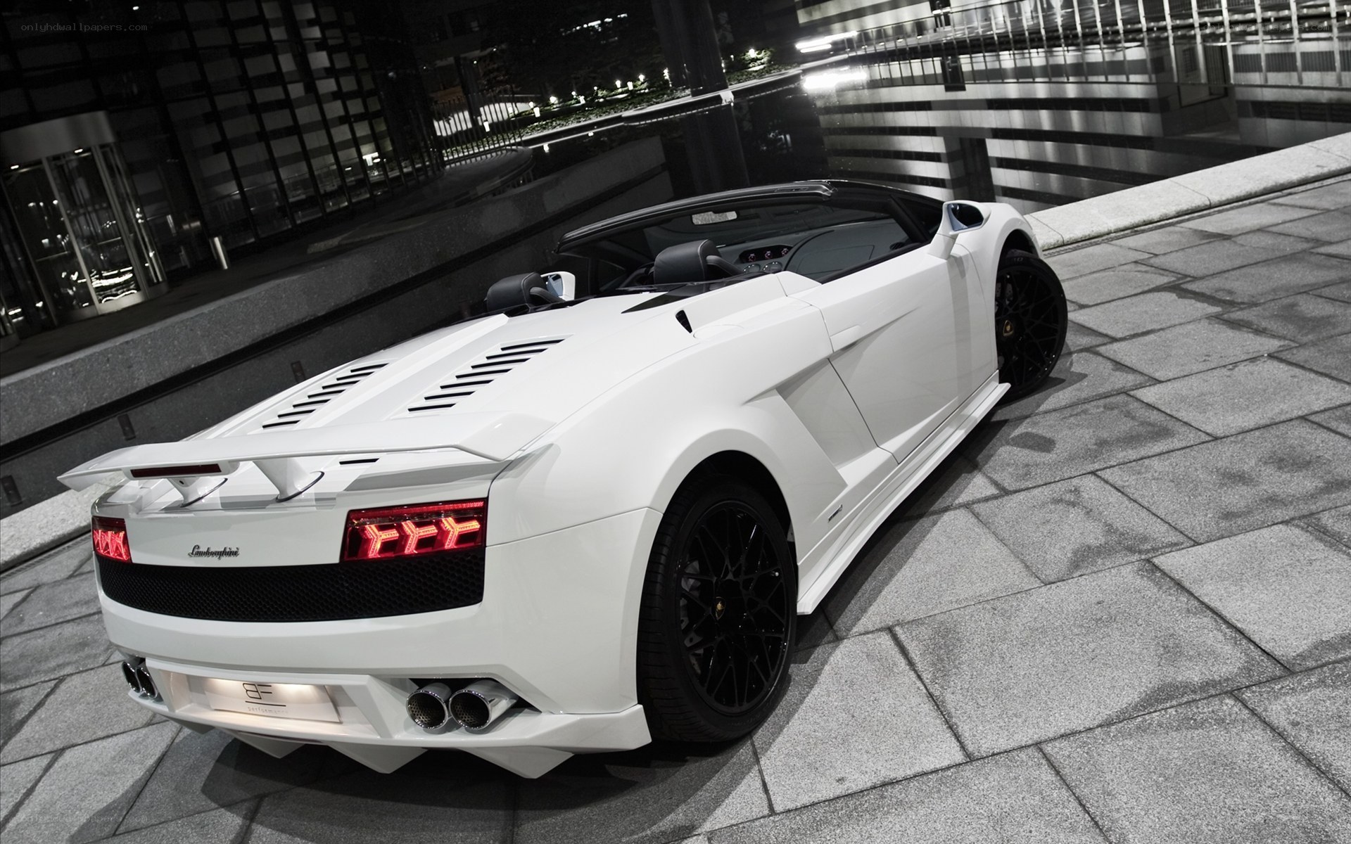 white lamborghini at night