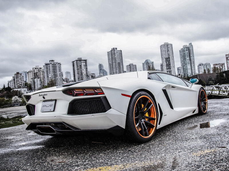 White Lamborghini Aventador — Dramatic, Photograph, City Skyline, Wet Pavement