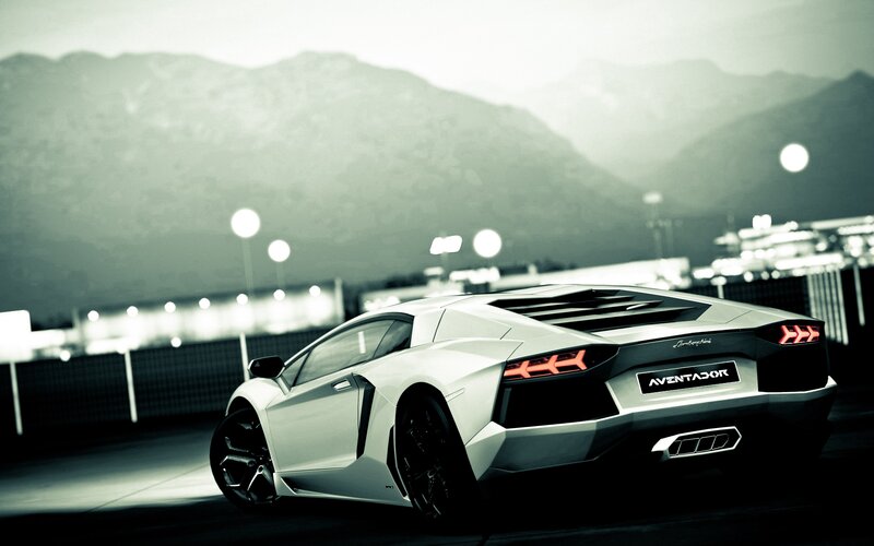 White Lamborghini Aventador on track