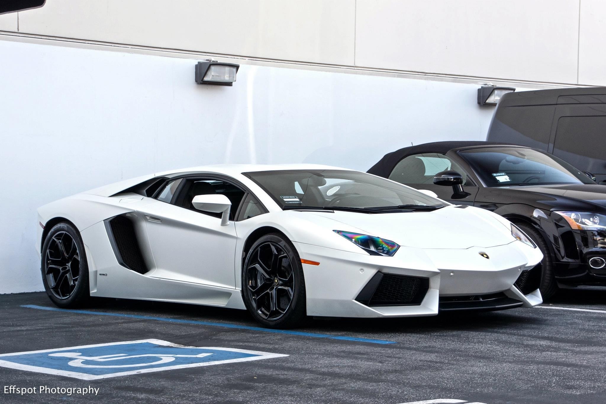 White Lamborghini Aventador parked