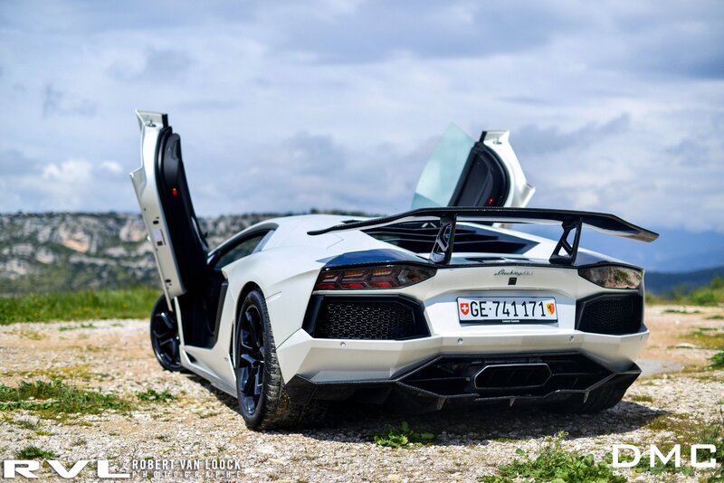 White Lamborghini Aventador with doors open