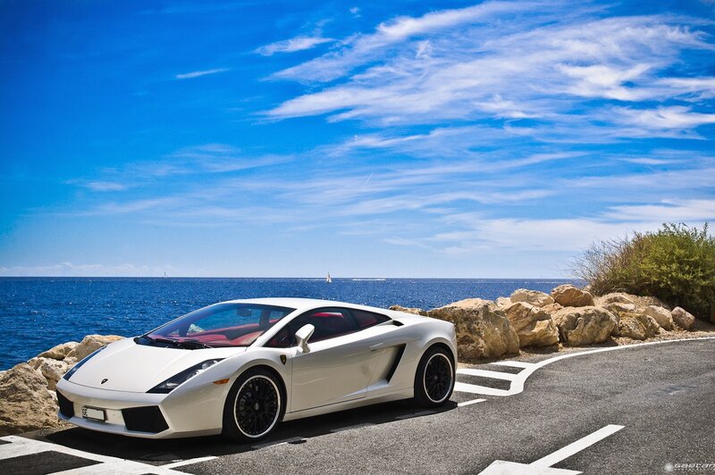 White Lamborghini by the sea