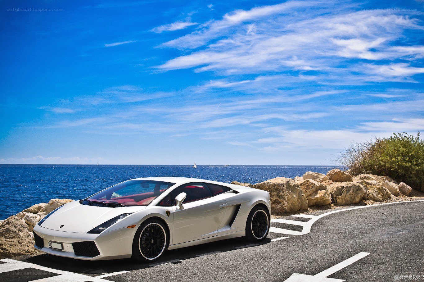 White Lamborghini by the sea
