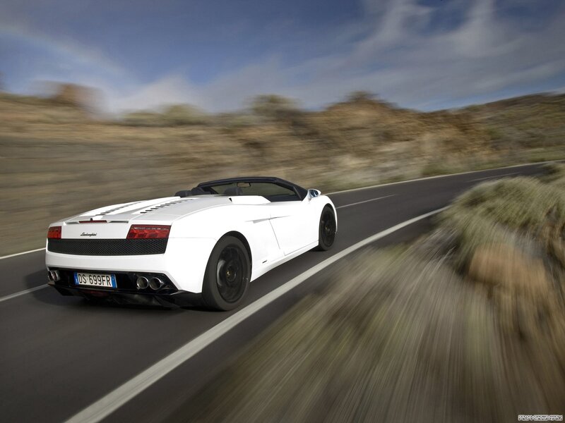 White Lamborghini convertible on road