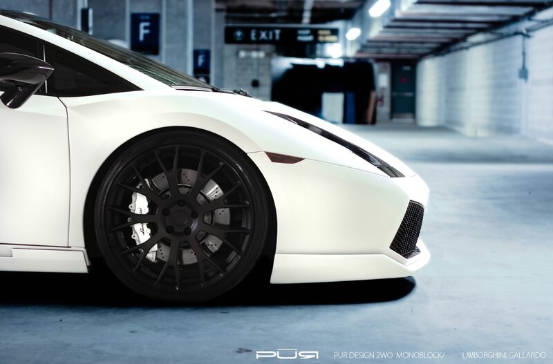White Lamborghini Gallardo in parking garage