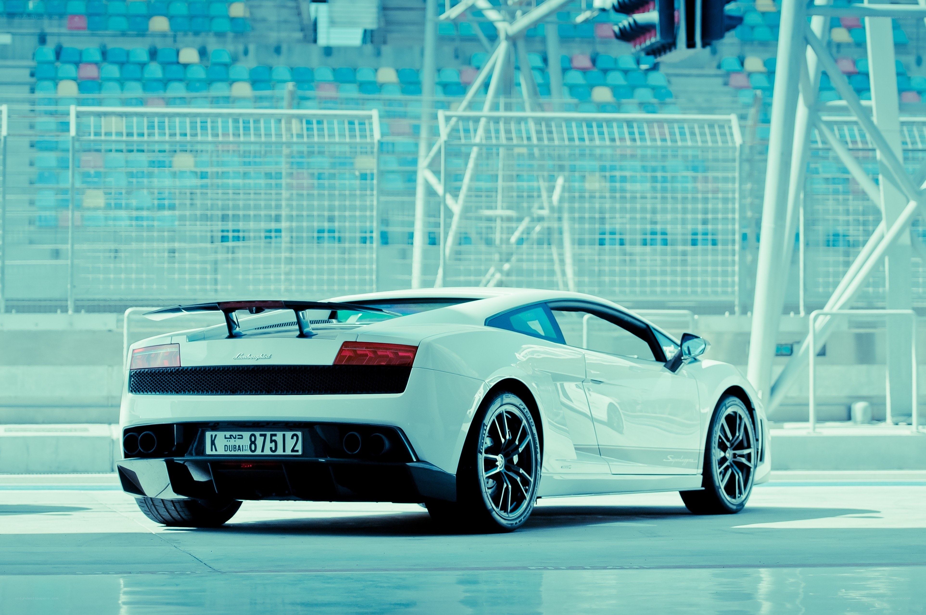 White Lamborghini in a stadium