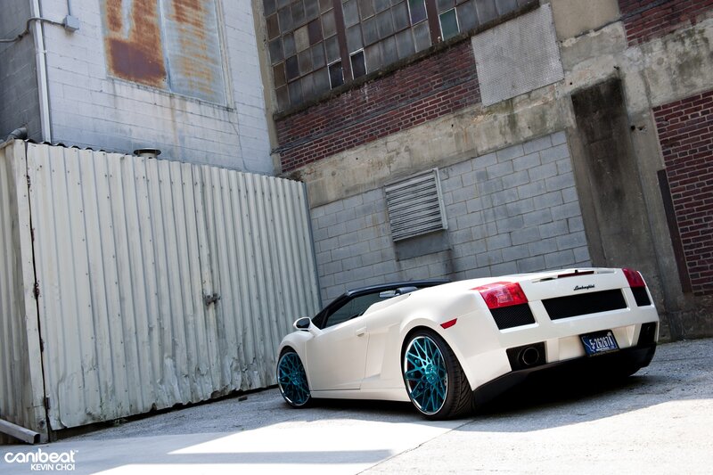 white lamborghini in alley
