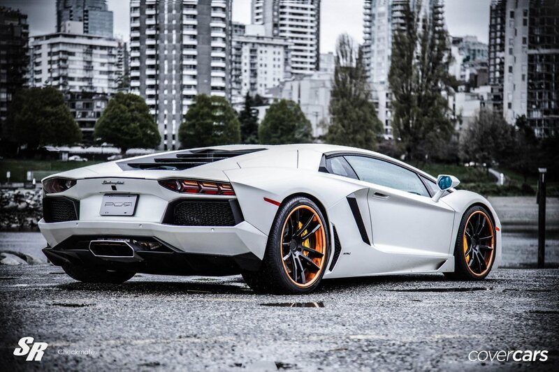 white lamborghini in city