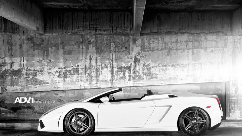 White Lamborghini in concrete garage