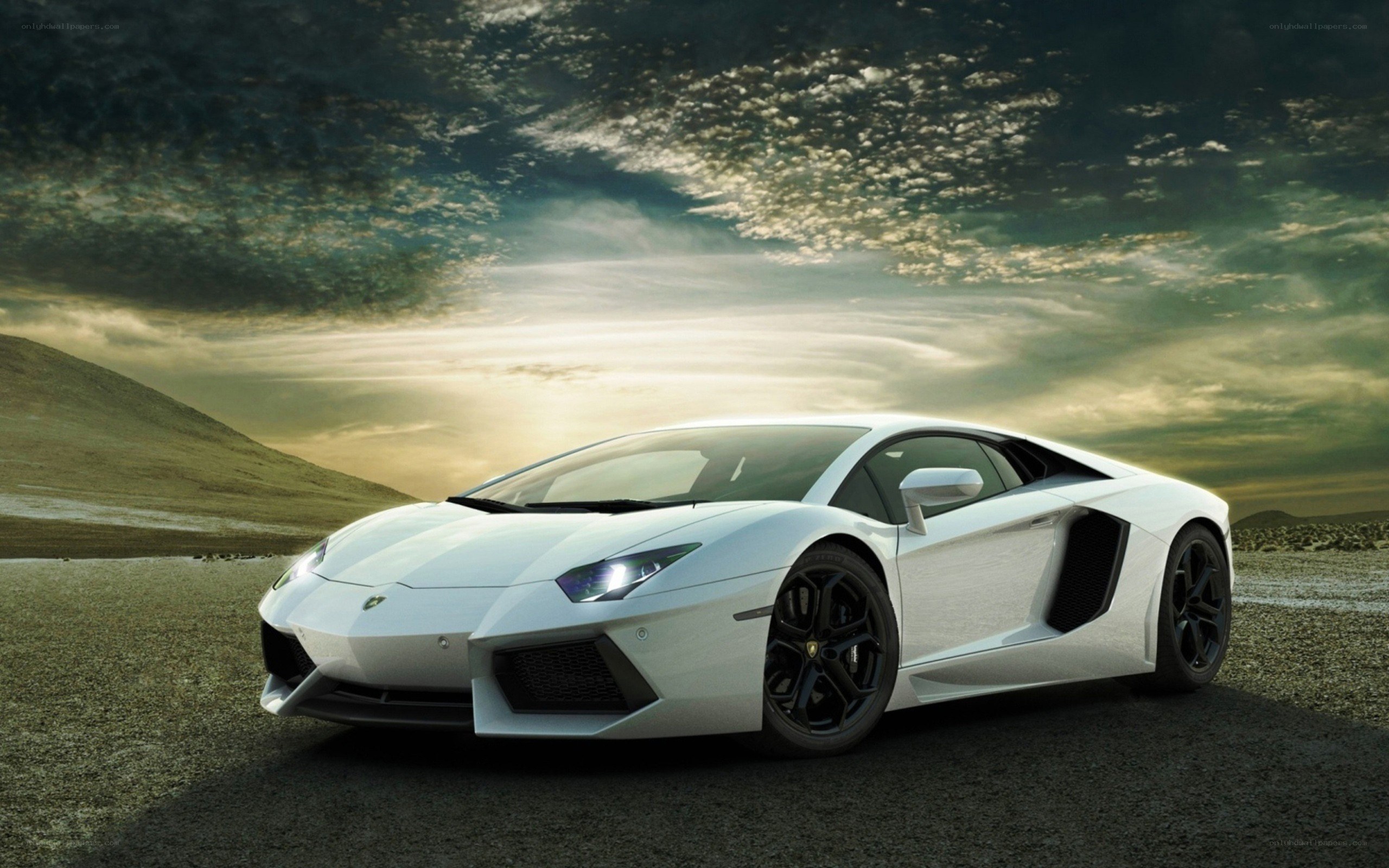 White Lamborghini in desert landscape