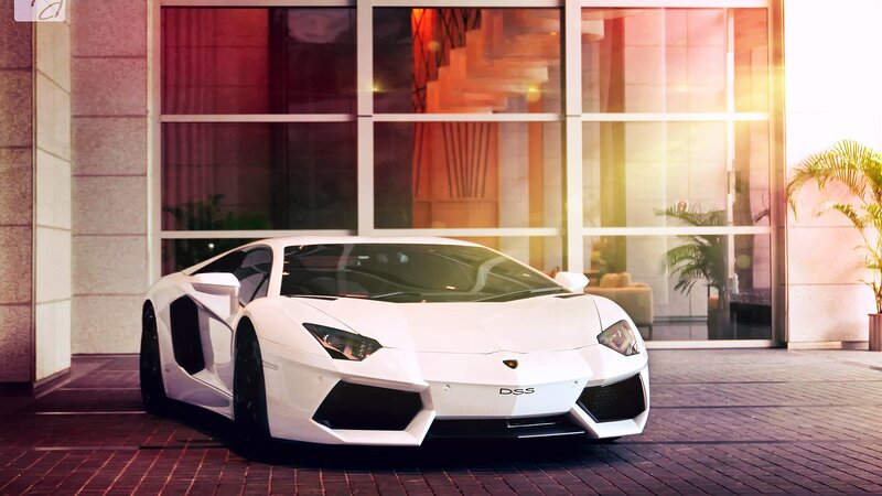 White Lamborghini in front of building