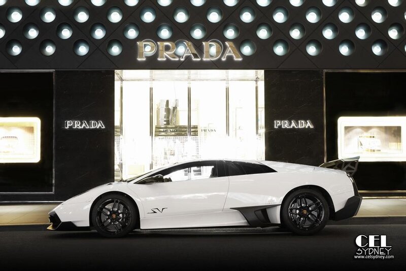 White Lamborghini in front of Prada