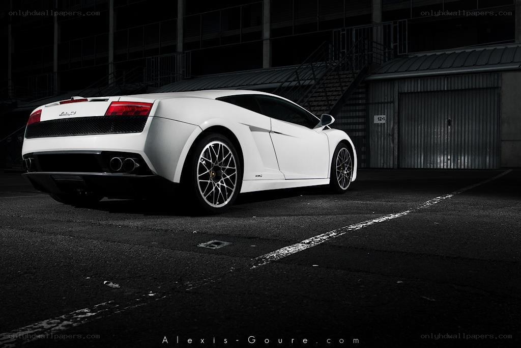 white lamborghini in garage