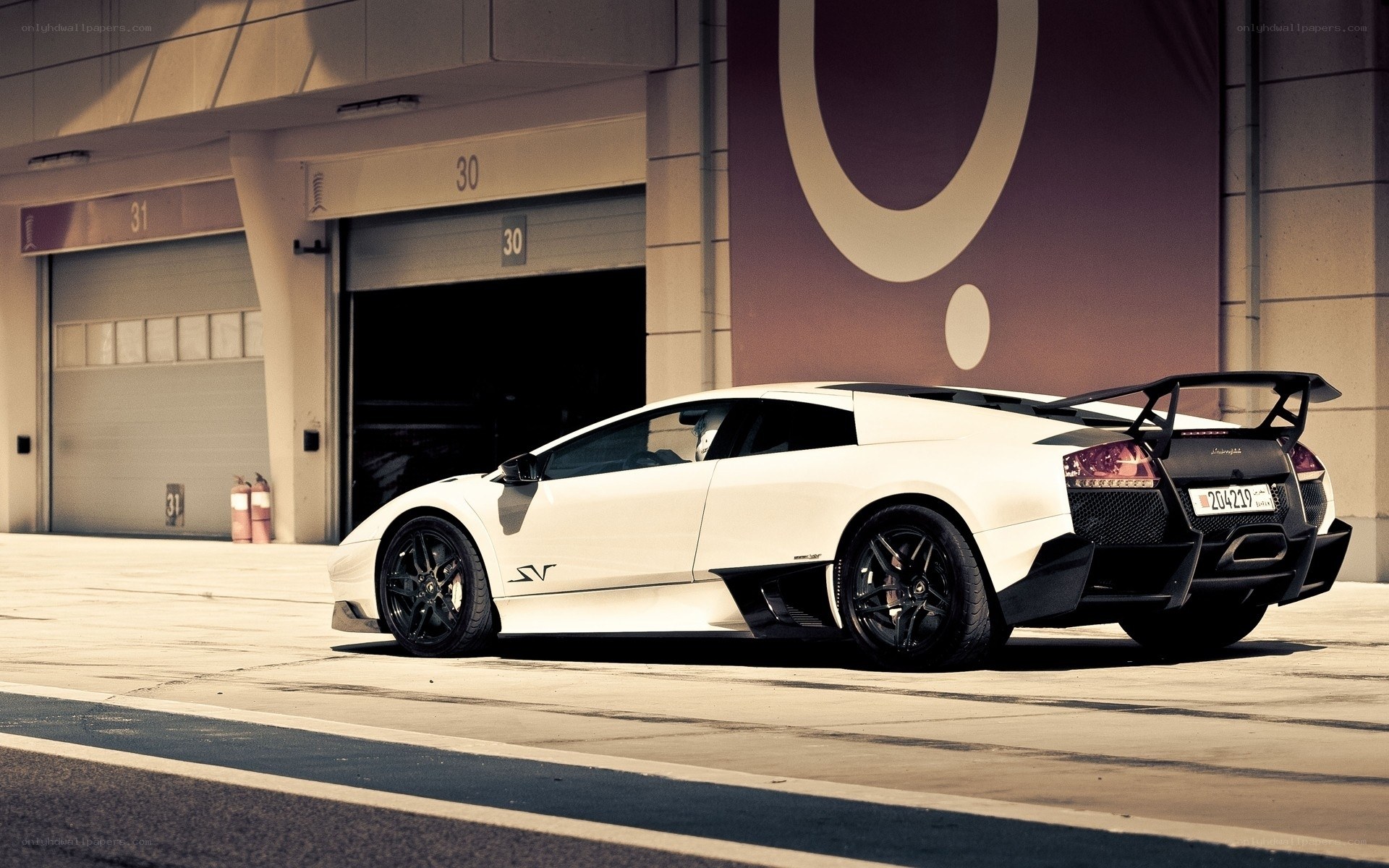 White Lamborghini in garage