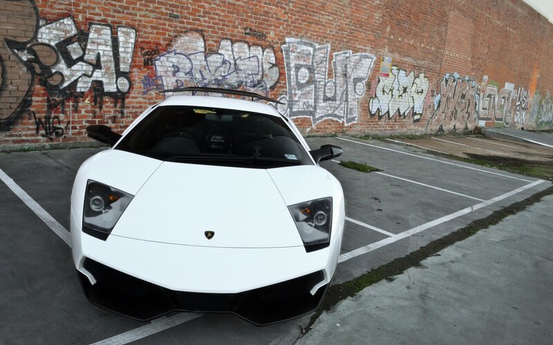 White Lamborghini in graffiti parking lot