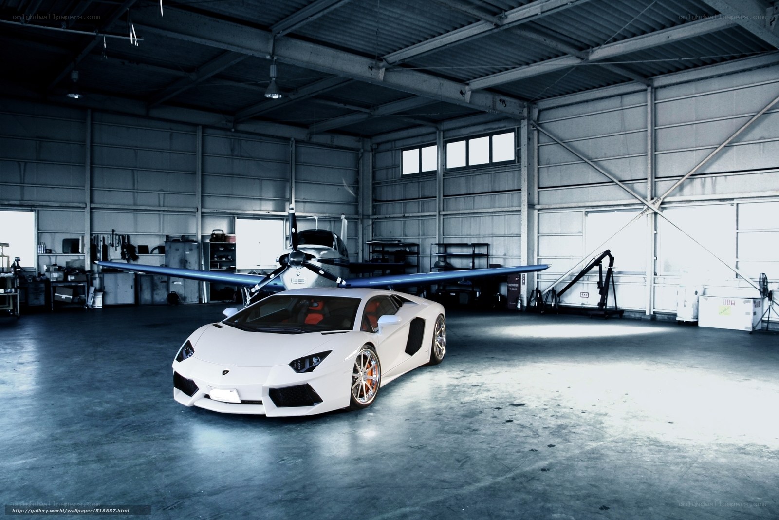 White Lamborghini in hangar