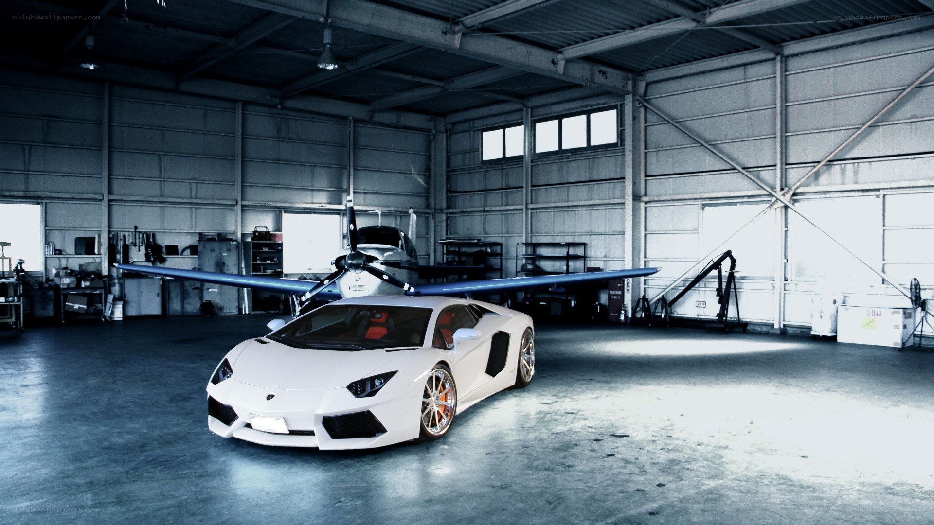 White Lamborghini in hangar