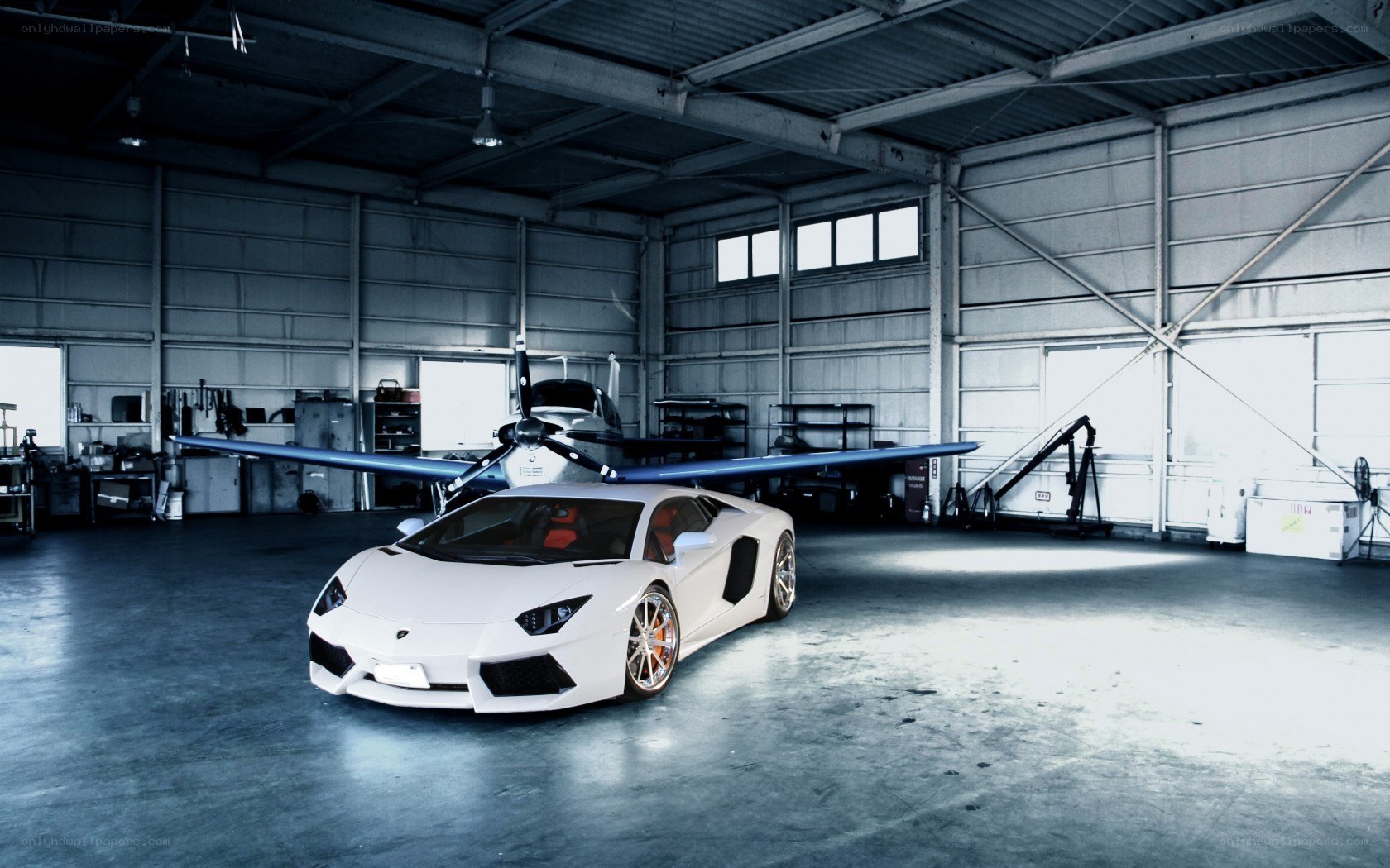 White Lamborghini in hangar