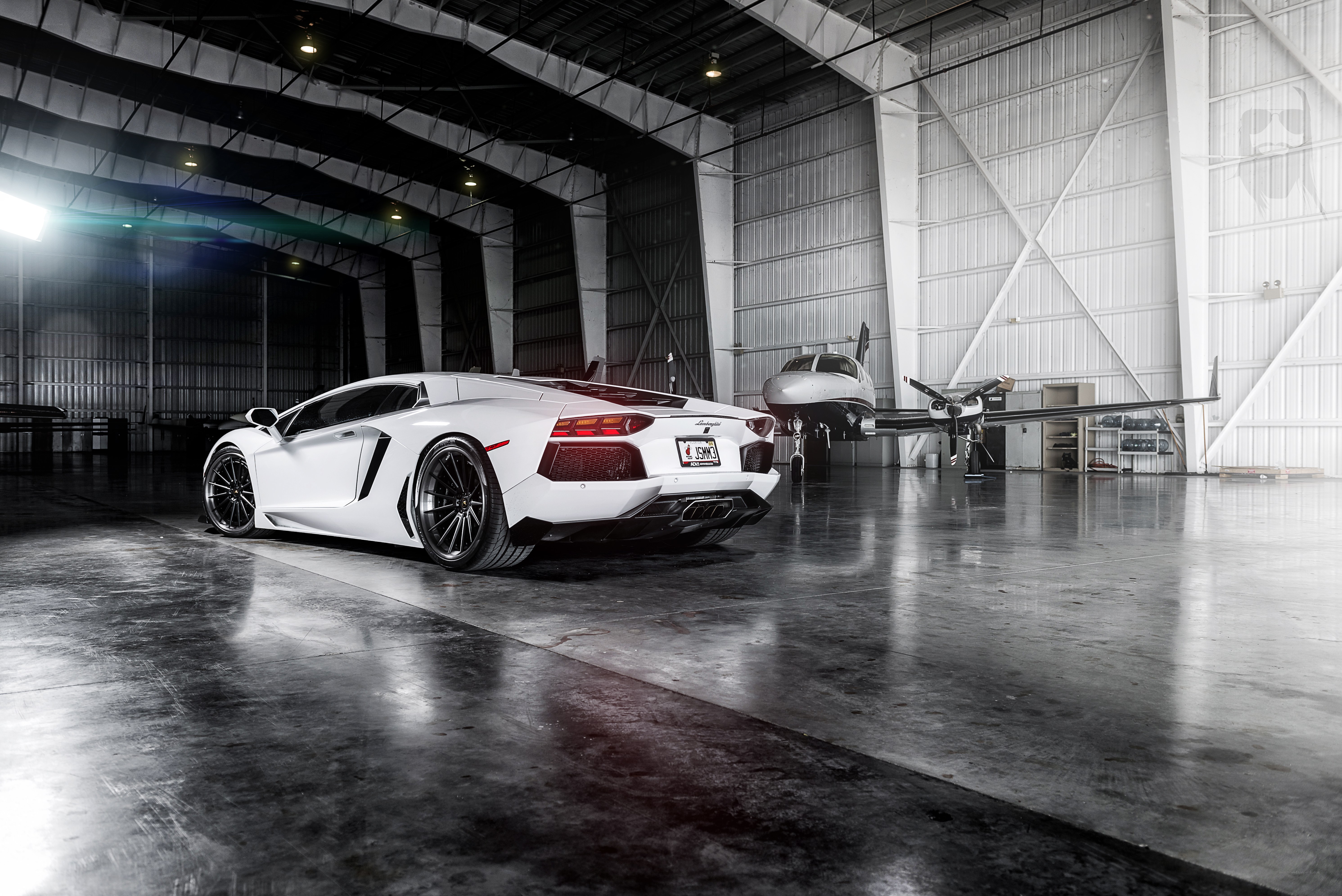 White Lamborghini in hangar