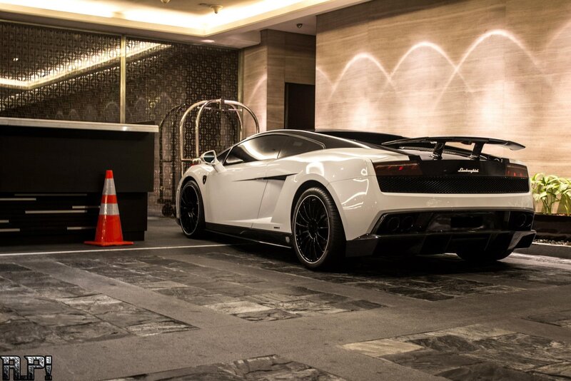 White Lamborghini in hotel lobby
