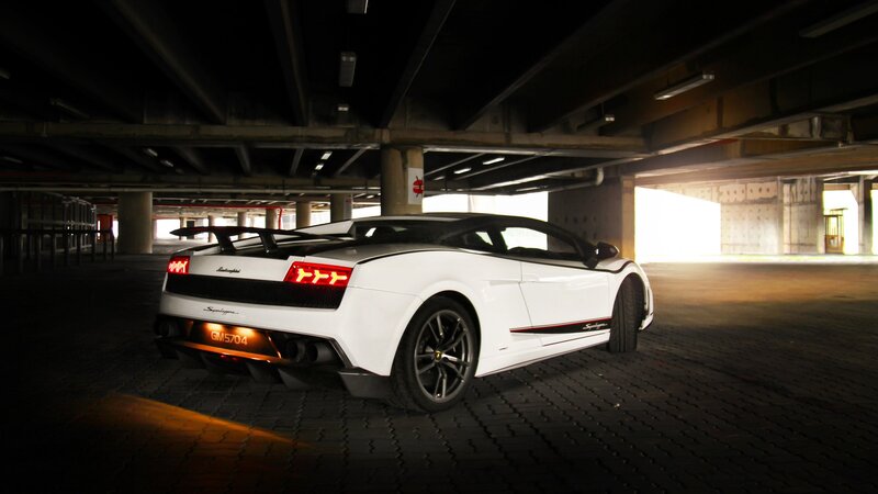 White Lamborghini in parking garage
