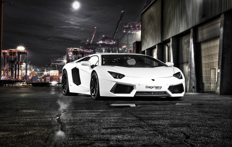 White Lamborghini in port at night