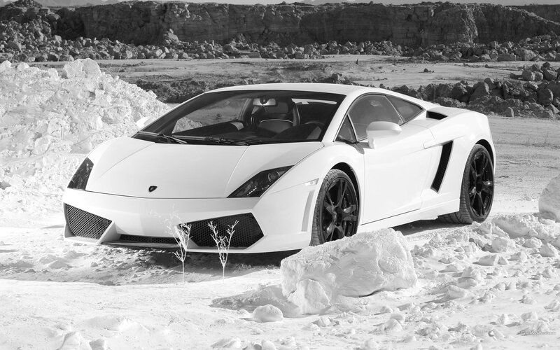 White Lamborghini in snowy landscape