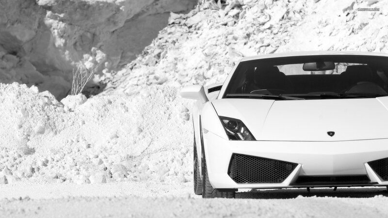 White Lamborghini in snowy landscape