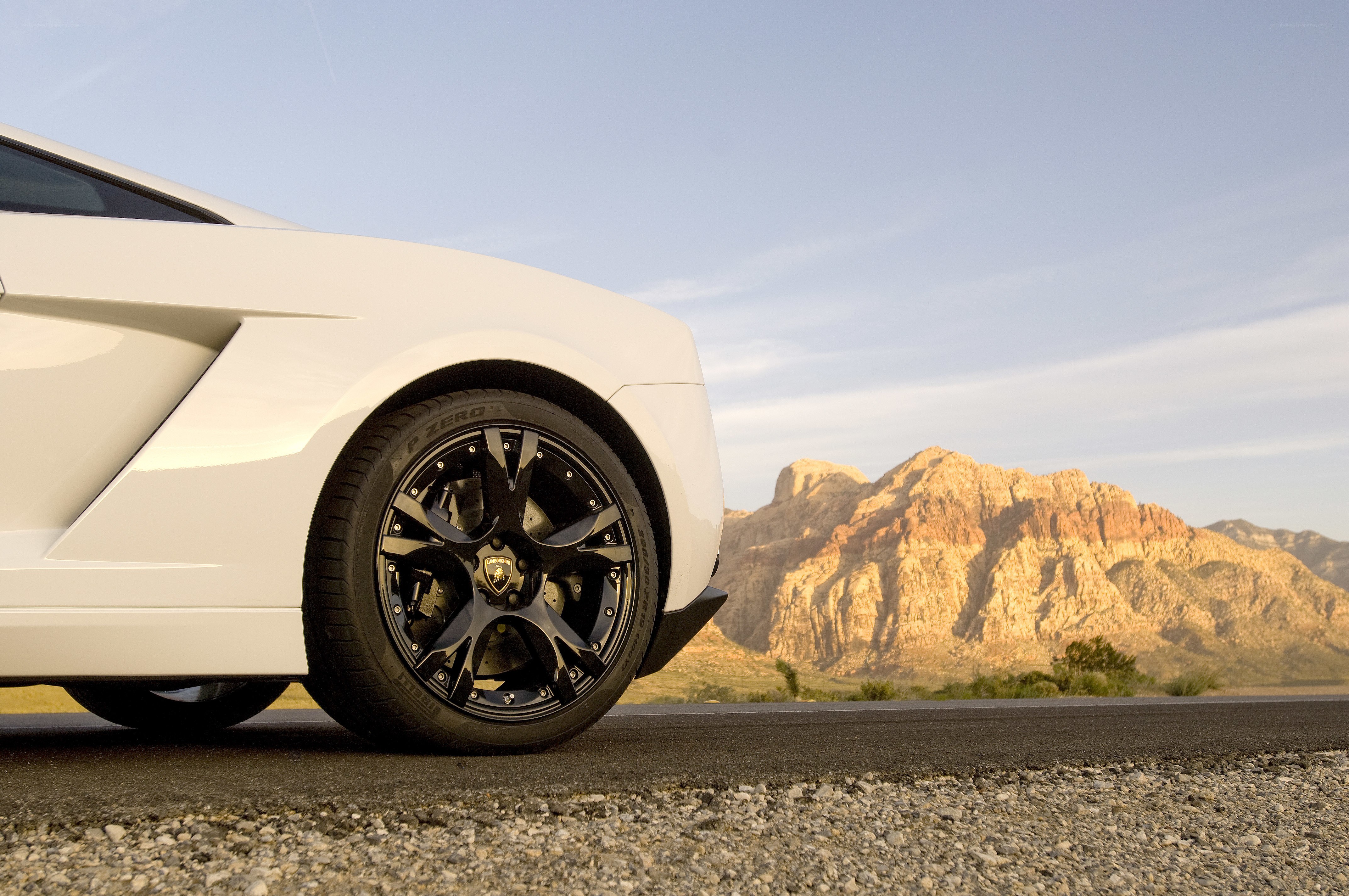 White Lamborghini on a desert road