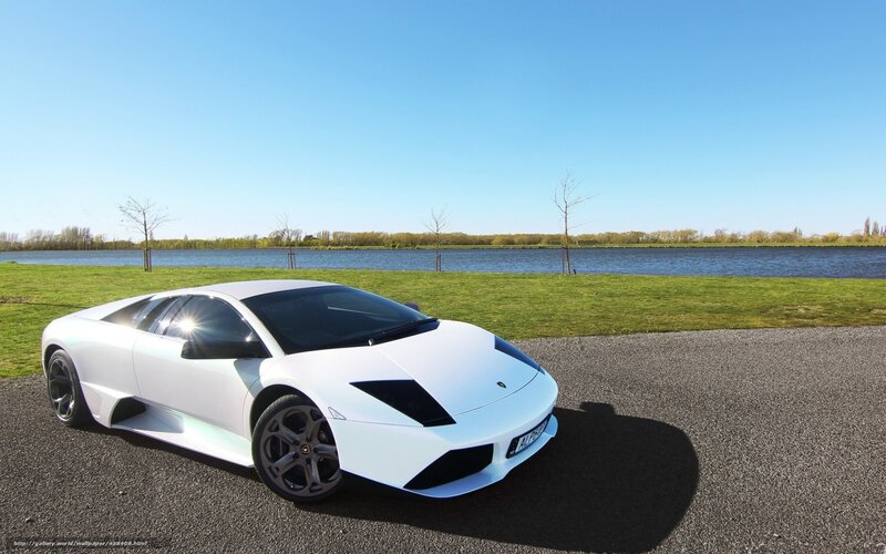 White Lamborghini on a lakeside