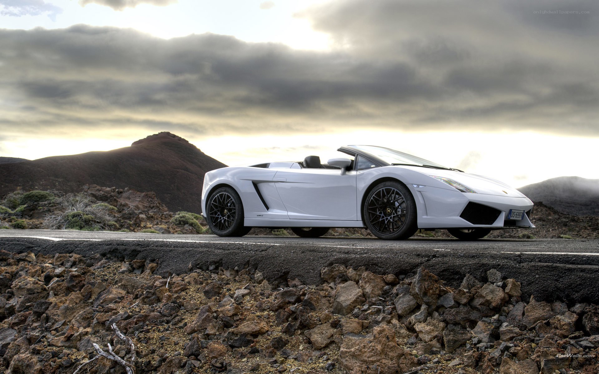 White Lamborghini on a mountain road