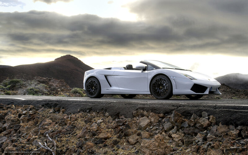 White Lamborghini on a mountain road