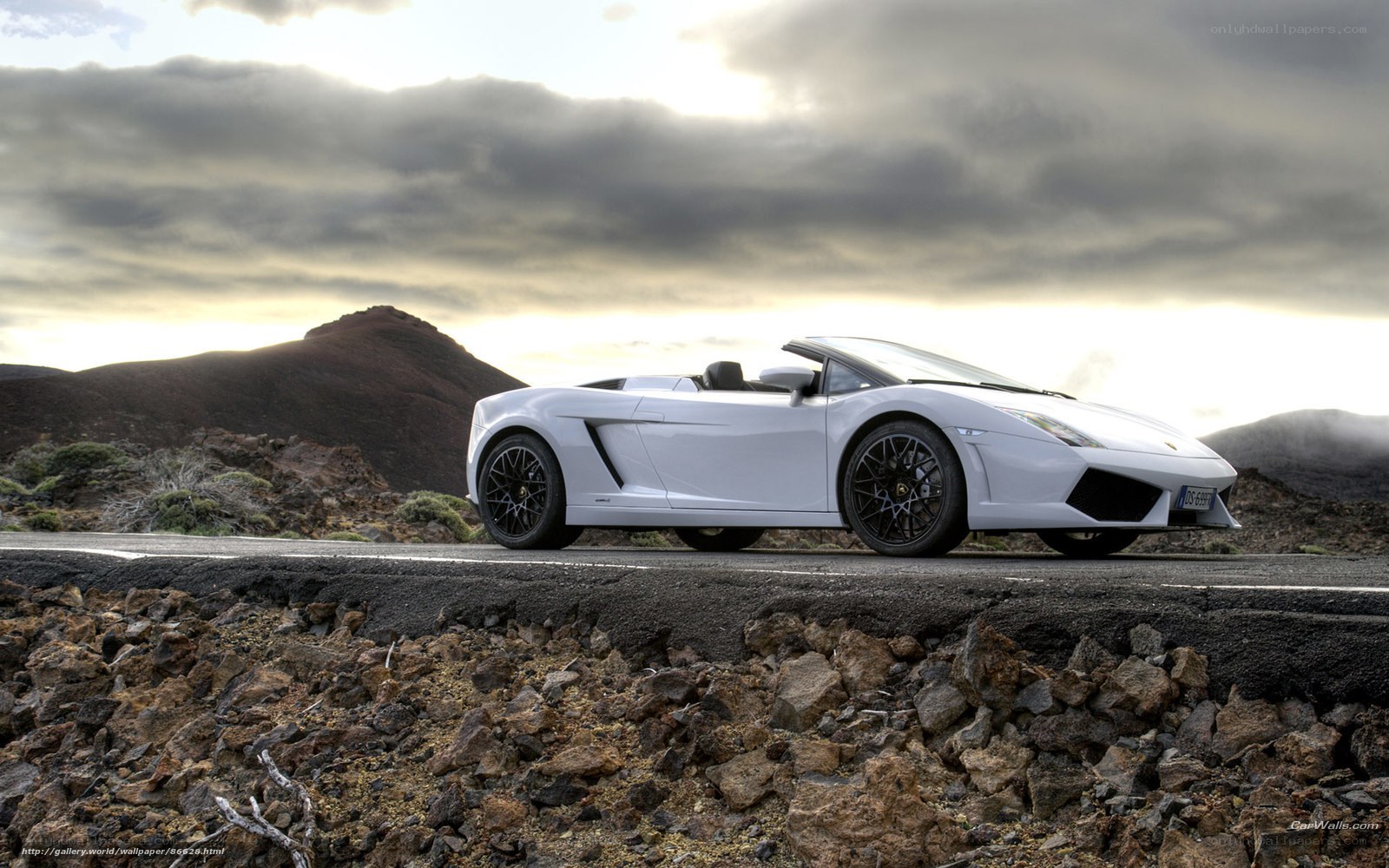 White Lamborghini on a mountain road