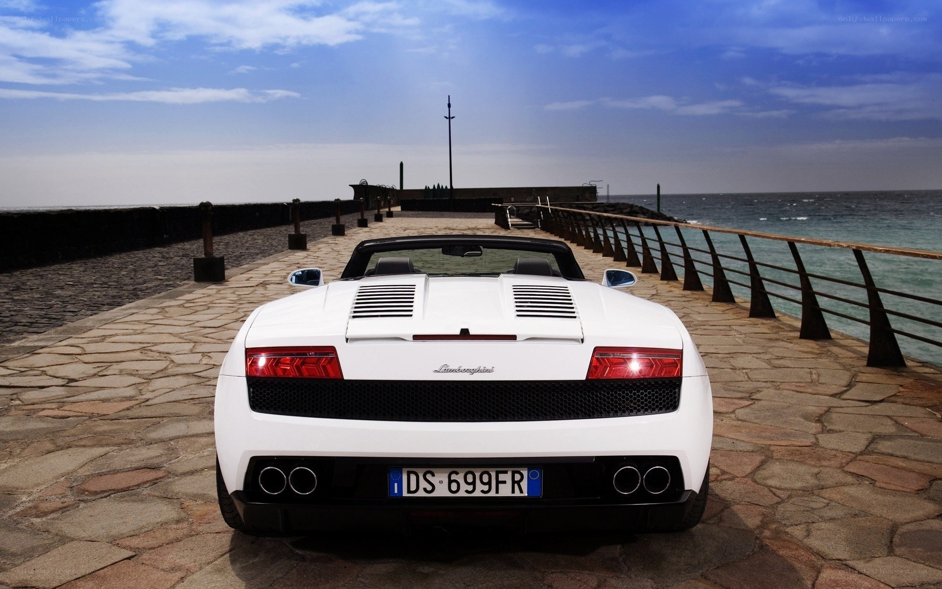 White Lamborghini on a pier