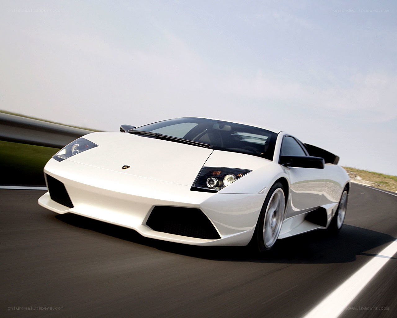 White Lamborghini on a racetrack