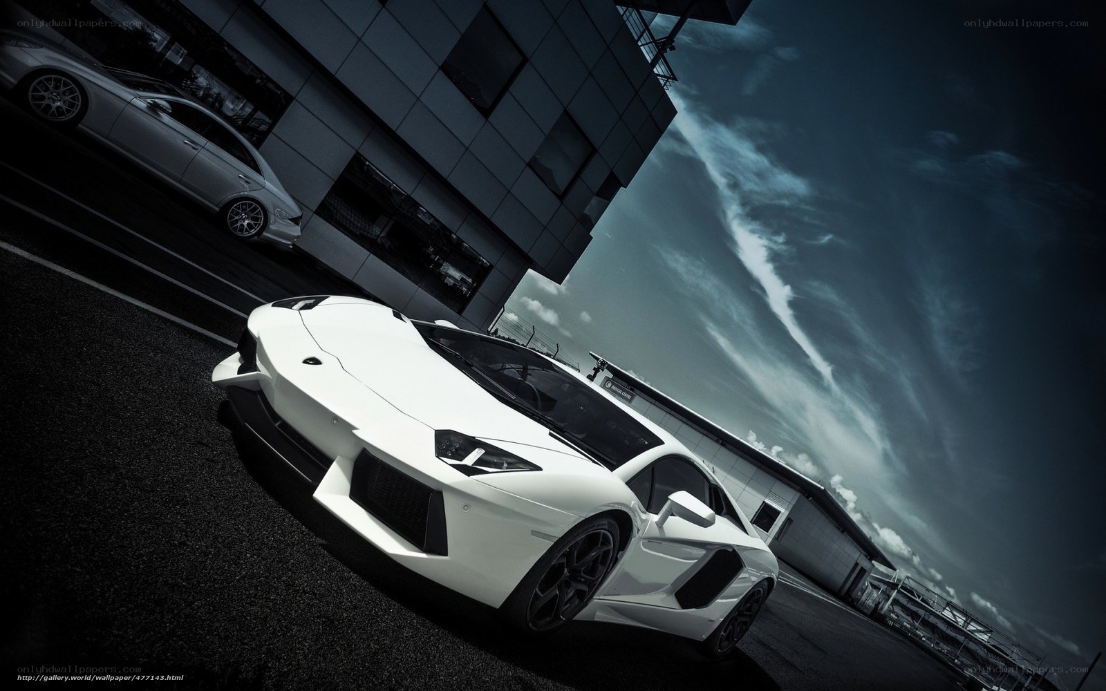 White Lamborghini on a racetrack