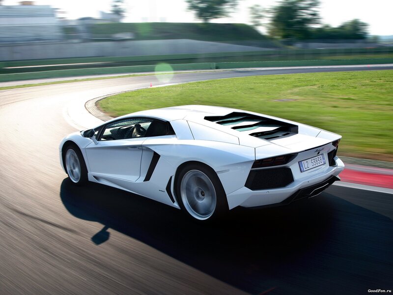 White Lamborghini on a racetrack