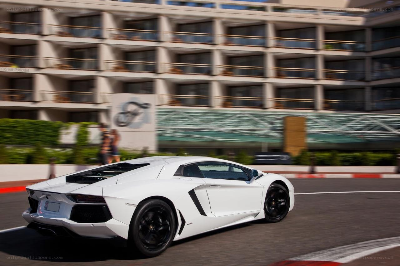 White Lamborghini on a racetrack