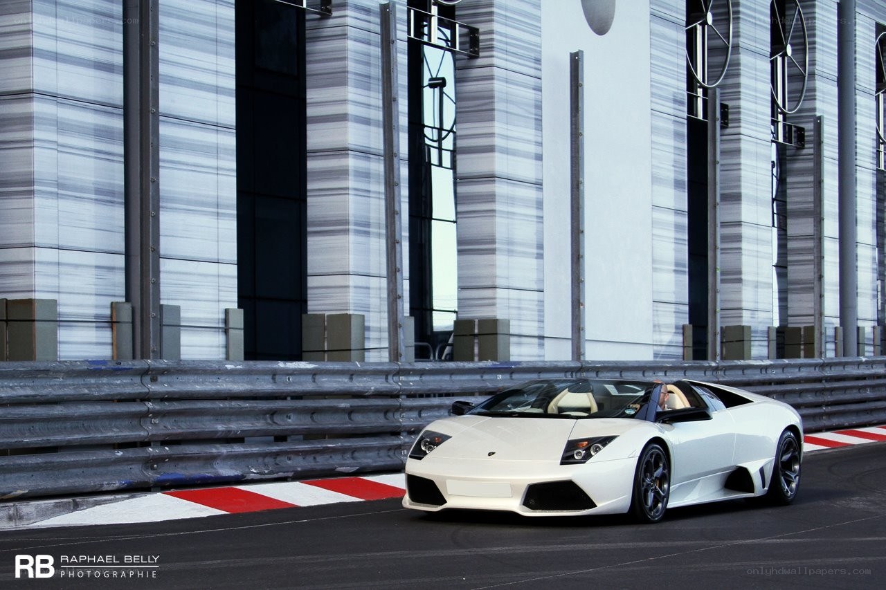White Lamborghini on a racetrack