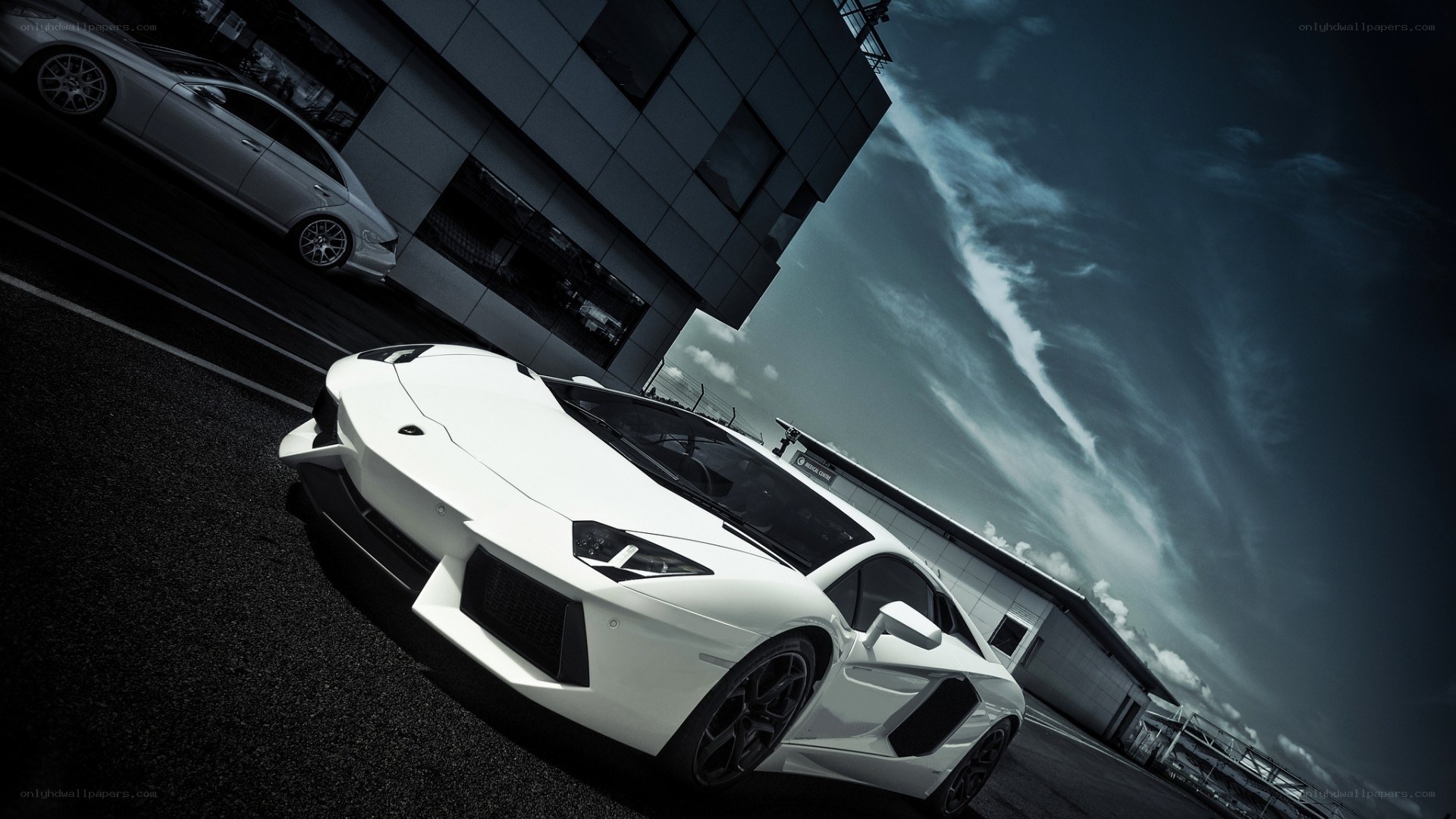 White Lamborghini on a racetrack