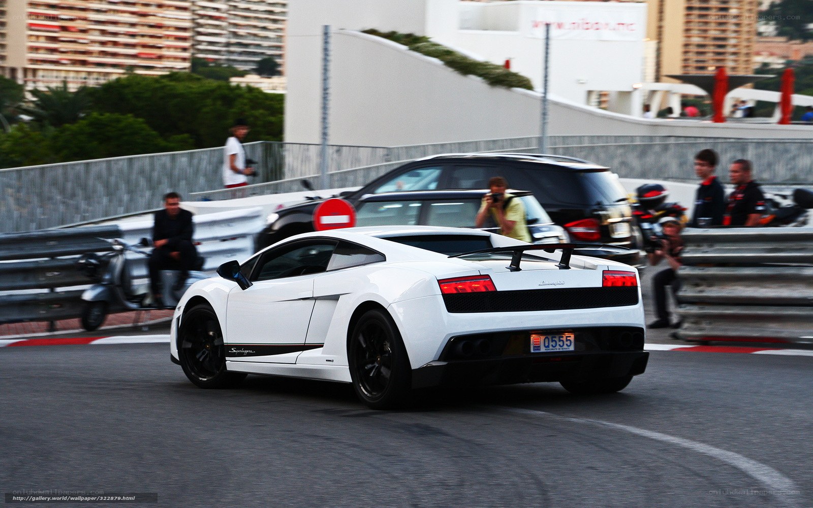 White Lamborghini on a racetrack