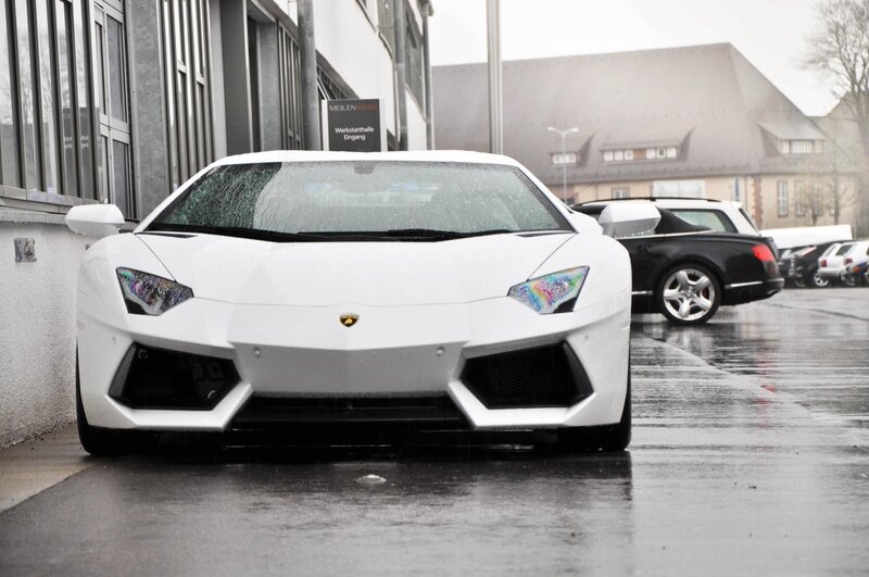White Lamborghini on a rainy day