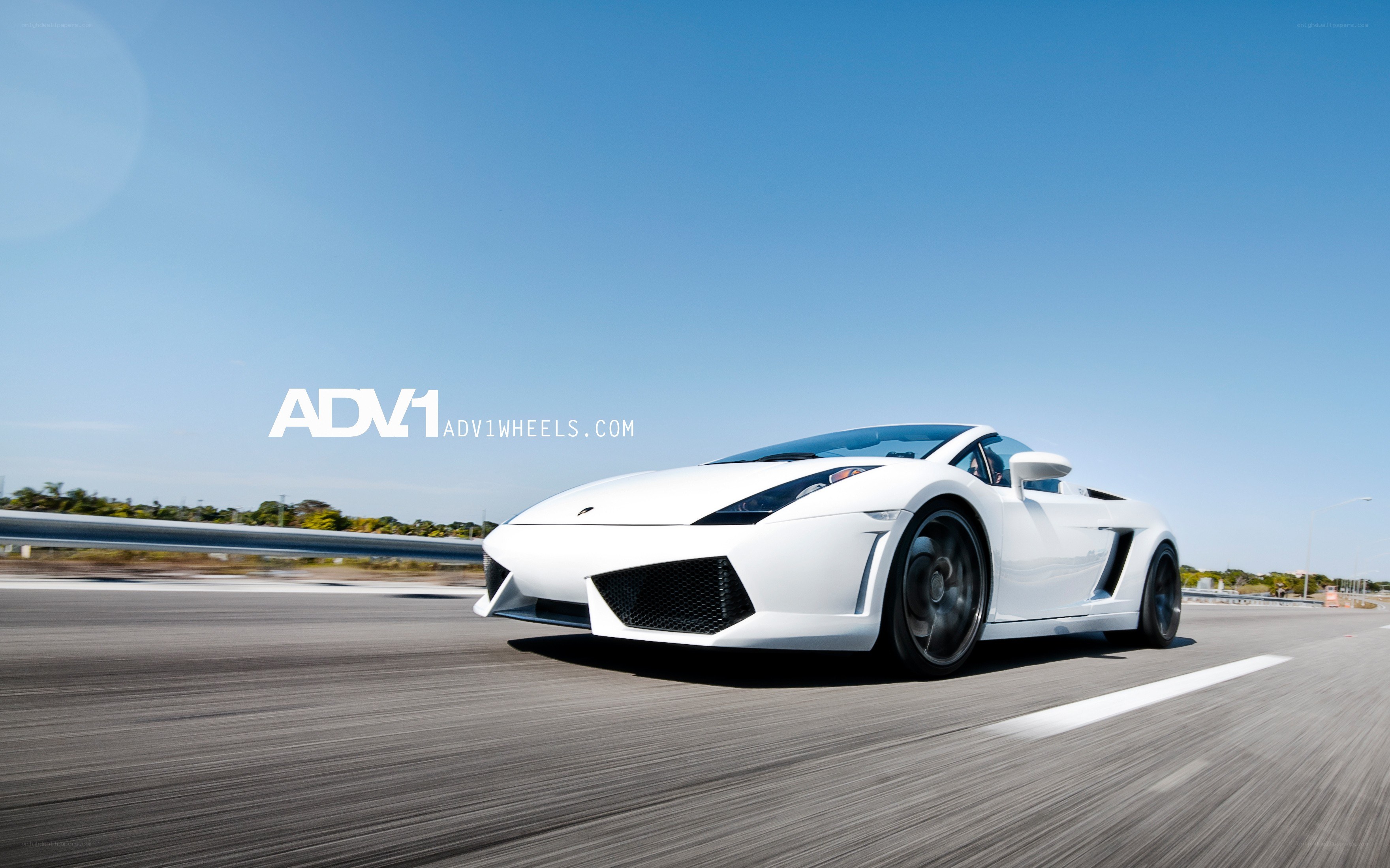 White Lamborghini on a road