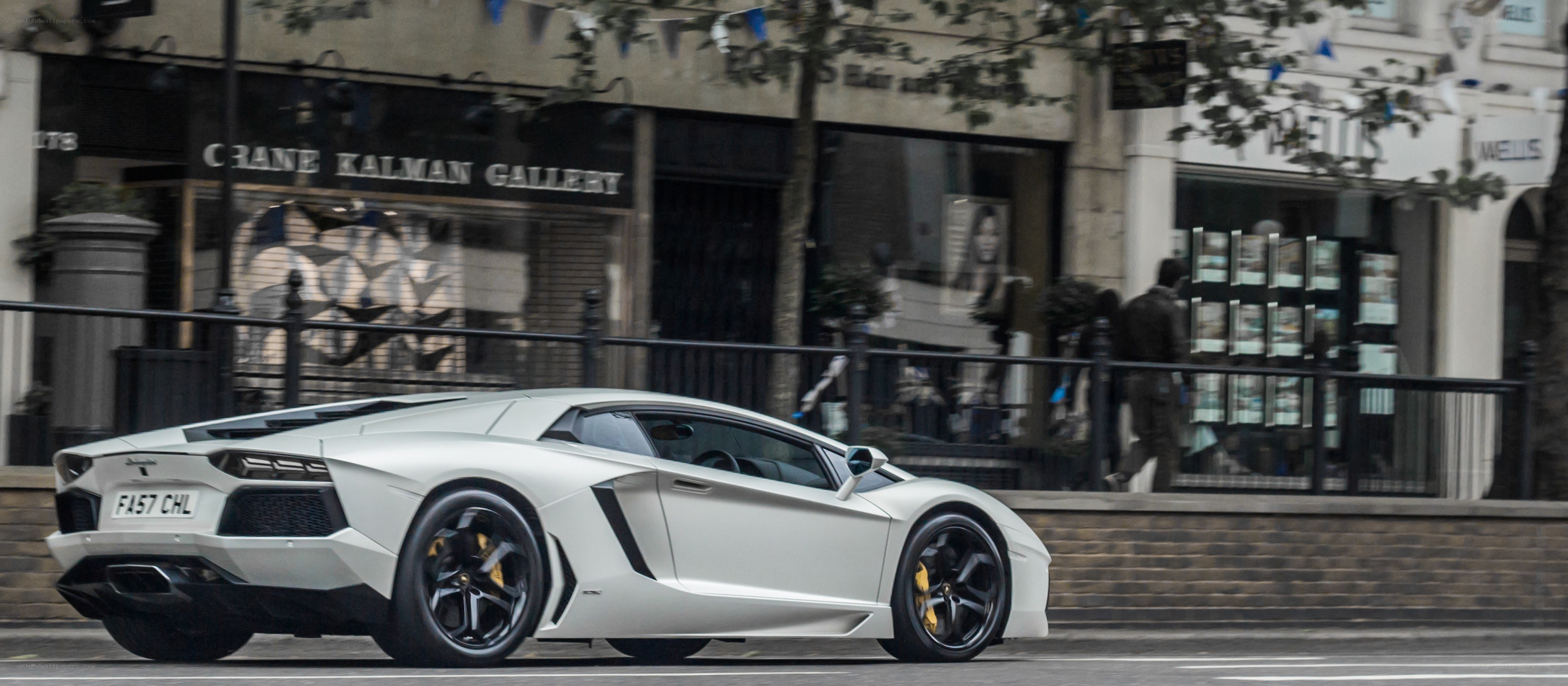 White Lamborghini on city street